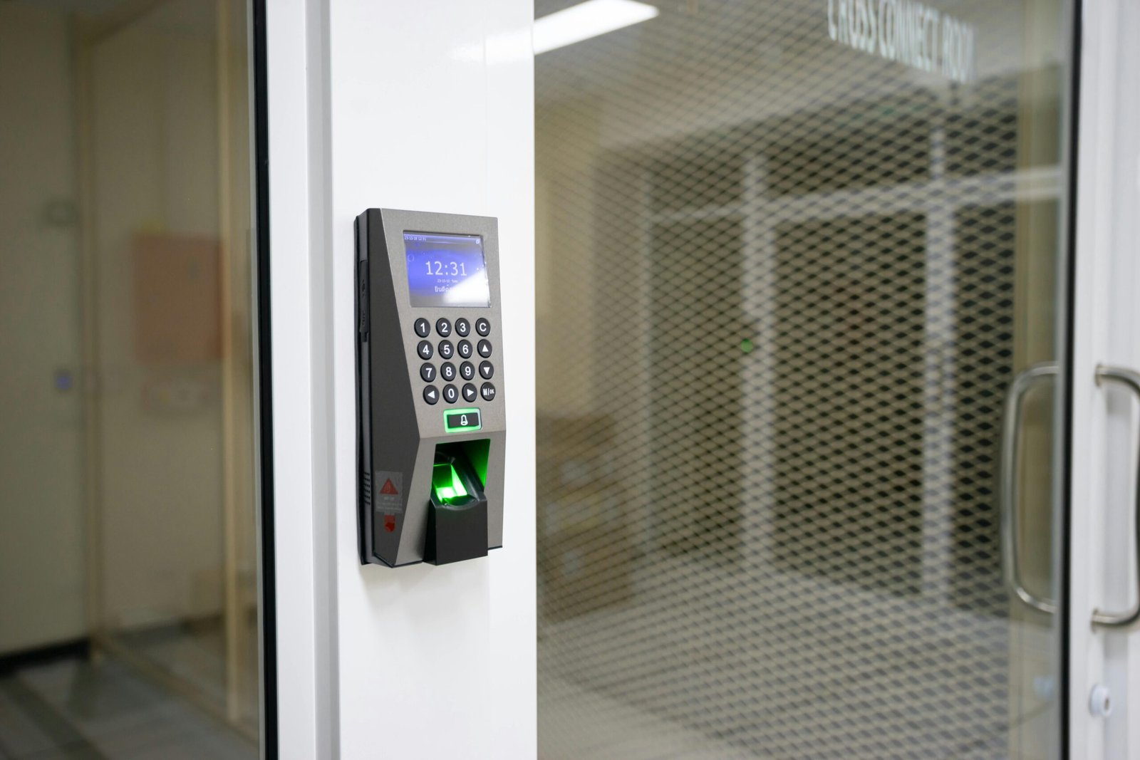 Other Industries A modern fingerprint scanner for secure access control in an office environment.